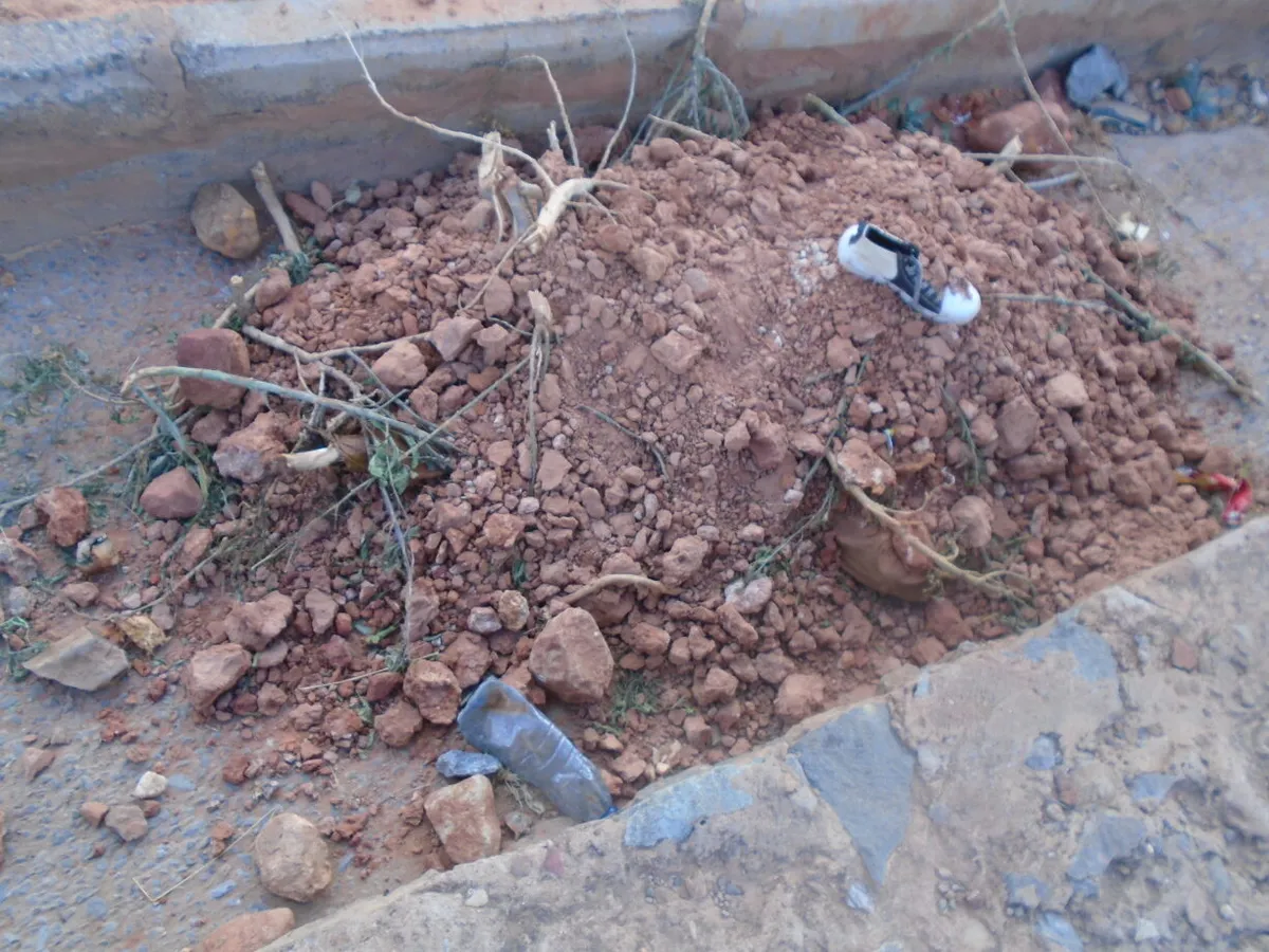 Photo taken at Werkamba ( Tigray ), as soon as the Ethiopian and Eritrean armies had left the town. For some weeks there were no military in Werkamba, and the residents who had fled found their town back in ruins, including killed civilians lying on the street. Their killing occurred between Decembe